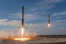 Side boosters landing